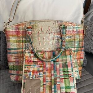 Brahmin designer handbag, matching wallet, great condition. Used twice.